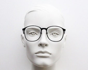 80s vintage oversized round glasses by RPL London. Plain black gloss optical frames. Prescription eyeglasses. RX Spectacles