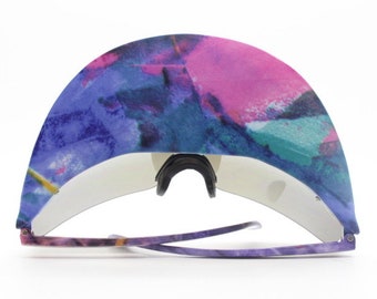 Mind bending 80's vintage visor sunglasses. Abstract paint splash peak frame with rainbow mirror mask shield monolens. NOS Rave grail