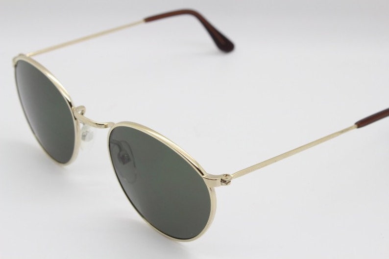 90s vintage refined aviator sunglasses. 60's style round metal frame with dark green lenses. BNWT. Unused NOS image 5