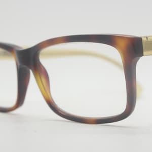 Hugo Boss rectangular glasses model BO 0068. Mottled brown acetate optical frames. Prescription eyeglasses. RX Spectacles