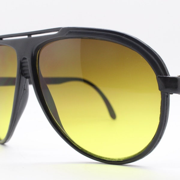 Vintage 70s aviator sunglasses. Black frame with sensational graduated amber lenses. Classic men's teardrop aviators. Unused NOS