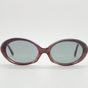 60s vintage oval acetate sunglasses. Deep plum womens mod frame with real mineral glass lenses