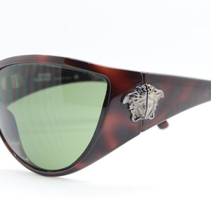 Versace Y2K vintage sunglasses model 874/M made in Italy. Big medusa 2000s wrap around tortoise frame. Club kids sick fashion.Mask shield