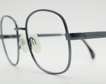 Yves Chantal 70s vintage large metal eye glasses made in West Germany by Zeiss. Slim metallic blue prescription eyeglasses. Optical frames