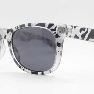 80s vintage wayfarer style sunglasses. All time classic design in dynamic dalmatian black and silver print. NOS