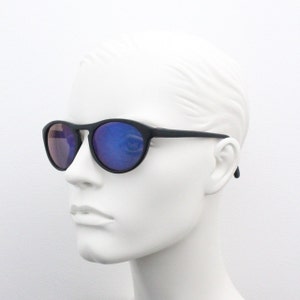 90s vintage oval sunglasses. 60s style curved black matt frame with blue mirror lenses. BNWT. NOS