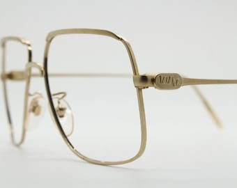 Lunettes de vue aviateur carrées vintage des années 70 fabriquées en Italie. Chaussures aviateurs homme en métal doré subtilement perfectionnées. Montures optiques. Réception