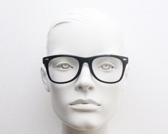 90s vintage wayfarer design glasses. All time classic black gloss optical frames. Prescription eyeglasses. Clear lens RX spectacles.