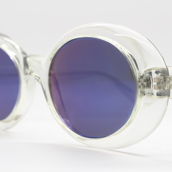 90s vintage oversized round sunglasses. Psychedelic transparent crystal frame with blue mirror lenses. NOS oval. Kurt Cobain clout goggles