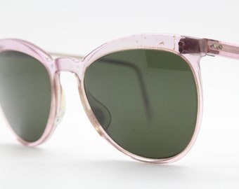 Vintage 40s pink lucite cat sunglasses. Womens transparent frame with green real glass lenses. 1950s rockabilly pin up