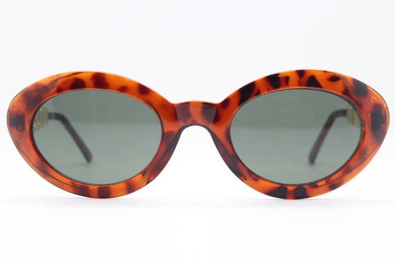 90s vintage cateye sunglasses. Womens oval tortoi… - image 5