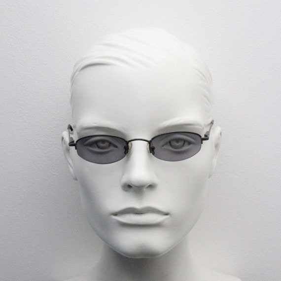 Carven 90s vintage micro sunglasses made in Paris.