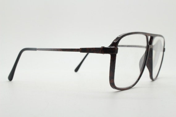 Gafas ópticas con montura estilo aviador en plateado y lentes de muestra de  Ray-Ban, ASOS