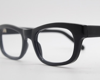 80s vintage rectangular glasses. Plain black gloss 60s design low profile optical frames. NOS prescription eyeglasses. RX spectacles