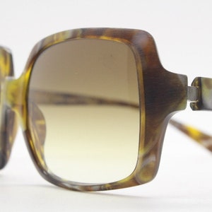 Alain Mikli Y2K vintage square sunglasses model 10690201 made in France. Womens brown marbled acetate frame with graduating lenses. 2000s