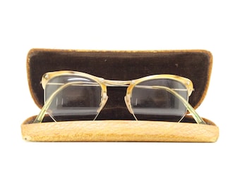 Gafas vintage art déco elegantes de los años 30. Monturas ópticas de media montura doradas para mujer. Gafas graduadas. Gafas antiguas.