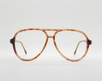 70s vintage acetate teardrop aviator eye glasses. Mottled brown optical frames in perfect proportions. Prescription pilot RX Aviators