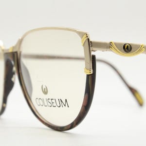 Coliseum 80s vintage eye glasses made in Italy. Stylised mottled brown optical frame with gold brow. Prescription RX eyeglasses. BNWT. NOS