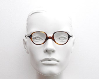 Vintage 40s slim abstract acetate glasses. Hand made tortoise saddle bridge frames. Prescription eyeglasses. 30s. RX antique spectacles