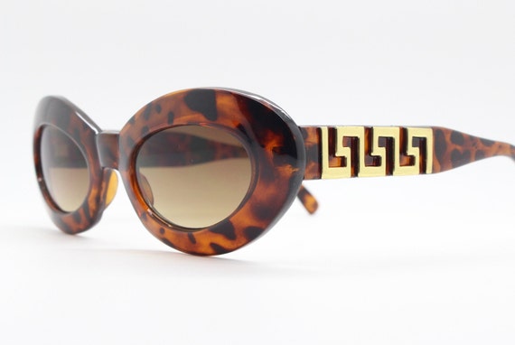 Gold arm sunglasses cheap