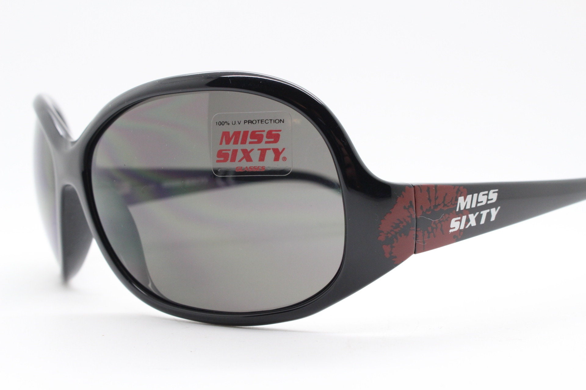 Gafas de sol vintage Miss Sixty Y2K. Masivo negro 2000s envolver alrededor ojo de insecto con logotipo de labios grandes. Mascara de gran tamano. 70s. Ninos del club. Rave de luxe