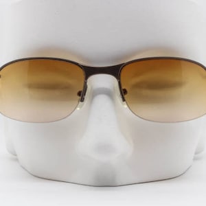 Y2K Vintage Rectangular sunglasses.  Metal half frame with radiant amber lenses. BNWT. 2000&#39;s NOS. 90s