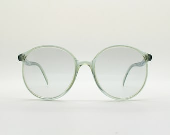 70s vintage oversized big round sunglasses made in Italy. Grey frame with light tone  real glass lenses and undulating arms. Women's. 80s