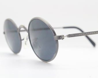 90s vintage oval sunglasses. Brushed Satin finish 20s design metal frame with black lenses and patterned arms. NOS. Victorian Steampunk