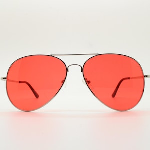 Y2K vintage aviator sunglasses. Bright red lenses in slim lightweight silver teardrop frame. 2000&#39;s pilot aviators. 70s