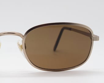90's vintage rectangular sunglasses. Matt satin gold frame with brown lenses. Unused NOS