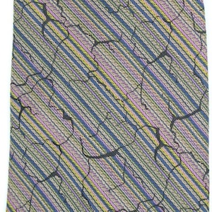 70s vintage big kipper neck tie made in the UK by Wembley. Woven diagonal stripe base with crackled lightning bolts pattern. Mens necktie