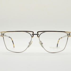 80s vintage metal flat top angular eye glasses made in Italy by Maga. Dynamic silver and gold optical frames. Prescription spectacles. BNWT