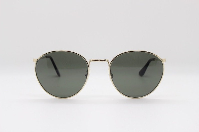 90s vintage refined aviator sunglasses. 60's style round metal frame with dark green lenses. BNWT. Unused NOS image 3