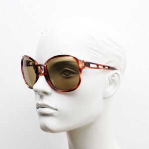 70s vintage oversized square sunglasses. Big mottled brown frame with luxury light tone real glass lenses and arm cut outs. Womens. 60s