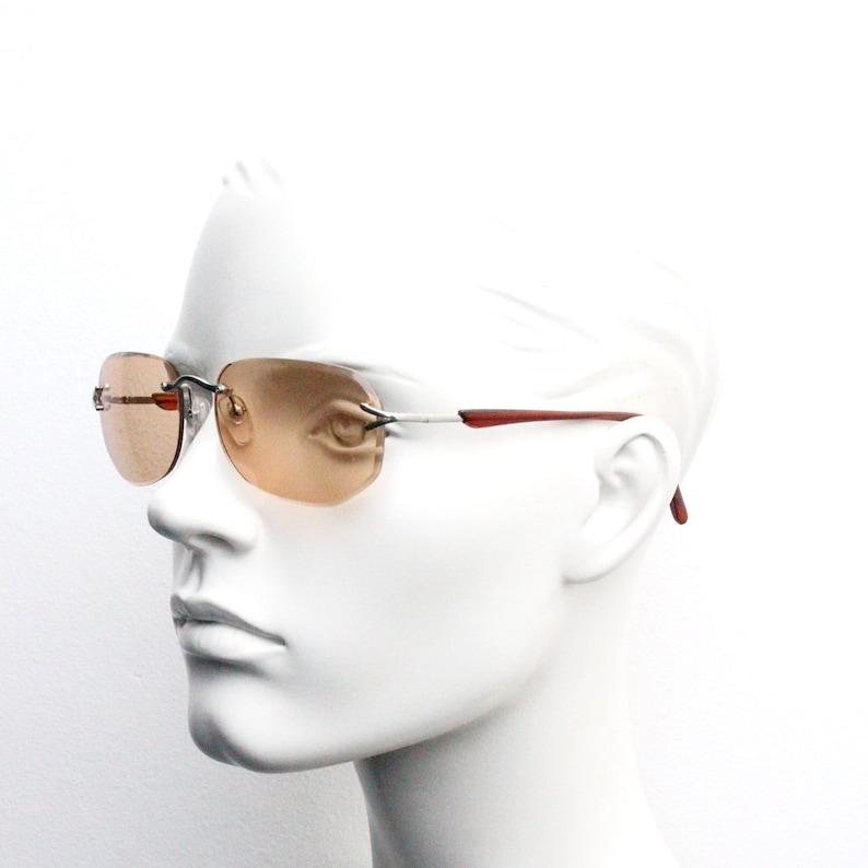 Y2K vintage sunglasses. Frameless light brown bevelled edge lenses with chrome connectors and slender arms. 2000s unused NOS. BNWT image 3
