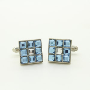 Vintage 90s square cuff links made in England. Metal construction with raised sky blue crystal mosaic squares. NOS