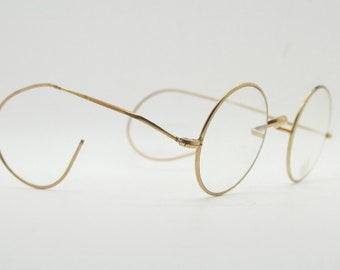 Runde goldgefüllte Vintage-Brille aus den 20er Jahren. Sauberer, antiker optischer Rahmen mit gewundenen Enden. RX-Brille mit Sehstärke der 30er Jahre. Gute Größe Medium