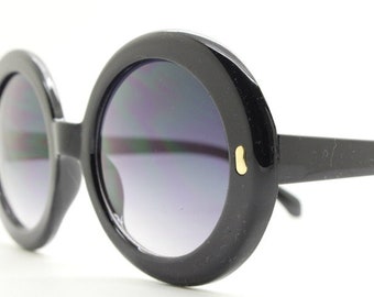 Y2K vintage 60s design oversized sunglasses. Round black gloss frame with smoky graduating lenses. Womens 70s. 2000s