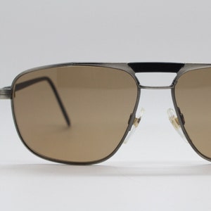 90s vintage small square aviator sunglasses. Matt satin finish frame with black bridge and arms and brown lenses. Mens aviators