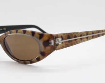 90's vintage lethal rattle snake print cateye sunglasses. Dynamic slim cat eye frame with brown lenses. Unused NOS