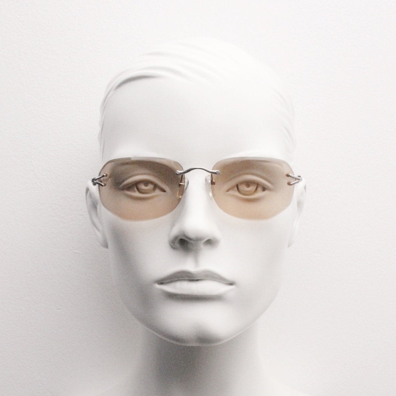 Y2K vintage sunglasses. Frameless light brown bevelled edge lenses with chrome connectors and slender arms. 2000s unused NOS. BNWT image 1