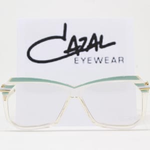 Cazal 80s vintage glasses model 181 made in West Germany. Turquoise and crystal optical frames with zig zag arms. Clear lens eyeglasses. RX