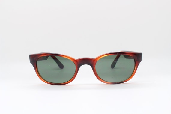 60s vintage cat eye sunglasses. Mottled amber and… - image 1