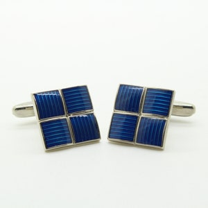 90s vintage square cuff links made in England. Solid metal construction with enamelled striped blue blocks pattern. NOS