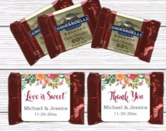 May include: Gourmet chocolate labels with floral designs and the text "Love is Sweet" and "Thank You". The labels are personalized with the names "Michael & Jessica" and the date "11-20-20xx".