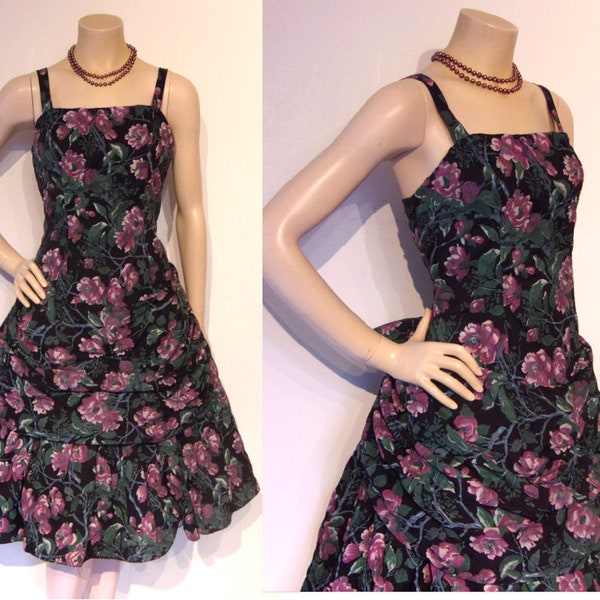 Fabulous late 1950s print cocktail dress w/spectacular hip draping Bust 38" Waist 31"