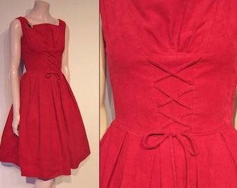 Heartbreaker 1950s red corduroy fit and flare dress w/peasant bodice, lacing Waist 24" petite Wounded but wow!