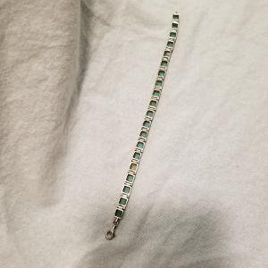 Sterling Silver 7 1/2 L. Sterling and encased Turquoise. Lobster Clasp. Marked 925. Gr8 Gift Idea. Excellent Condition Free Shipping in USA