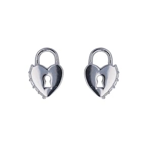 May include: A pair of silver-toned stud earrings shaped like heart-style padlocks. Each earring features a smooth, metallic heart-shaped body with a central keyhole cutout and a small, rounded shackle at the top, reflecting light on the surface.