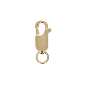 May include: Gold-toned metal clasp with a spring-loaded closure and a round jump ring. This clasp is commonly used for necklaces, bracelets, and other jewelry.